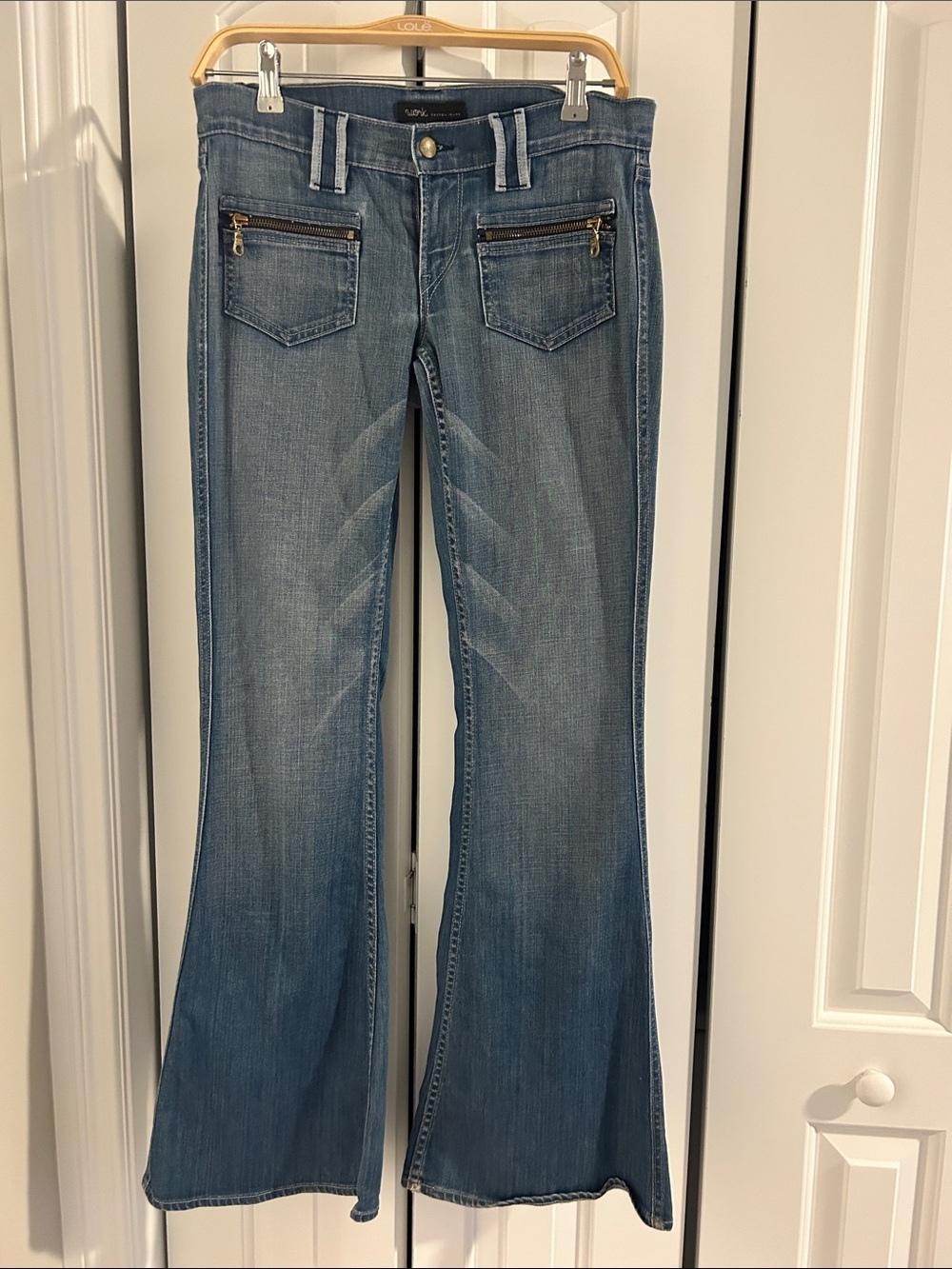 Classic Blue Flare Jeans with Zip-Front Pockets